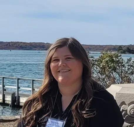 Headshot on a dock overlooking water