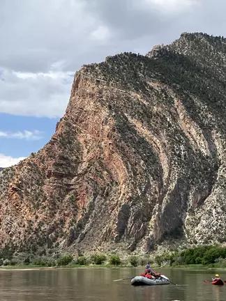 Image of geologic structure with water at its base