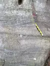 NAGT Geo2YC pencil as scale for cross stratification in quartzite at Pilot Mountain.
