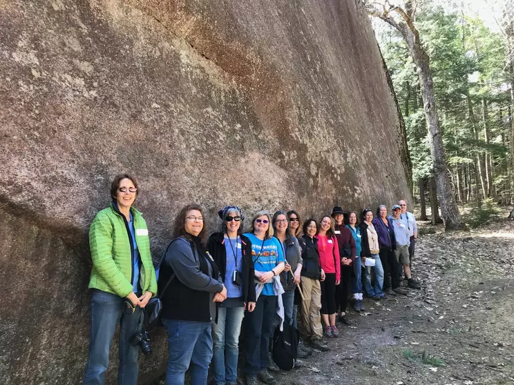 Teachers at the largest glacial erratic in the USA