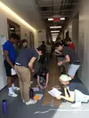 Students completing an activity in a hallway
