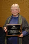 Marjorie McKinney with the Neil Miner Award