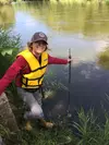 Gathering water quality data at the Cannon River in Minnesota