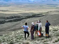 Students discussing map relationships at ISU field camp