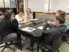 Students work together on an engineering design project.