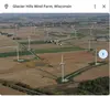 A screen shot from a renewable energy virtual field trip showing wind turbines in agricultural fields.