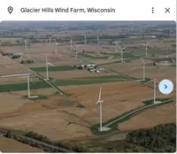 A screen shot from a renewable energy virtual field trip showing wind turbines in agricultural fields.