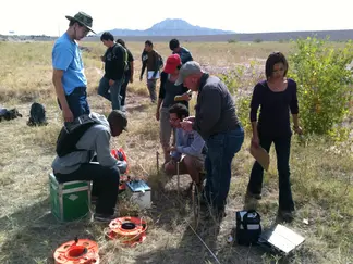 Students in a Geophysical Methods field course engaged conducting a geophysical study.