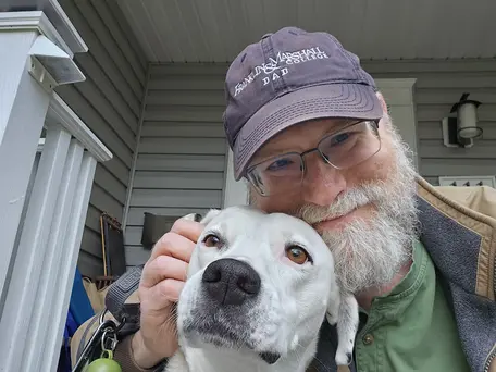 Pepper and her human, Fred Marton (top).