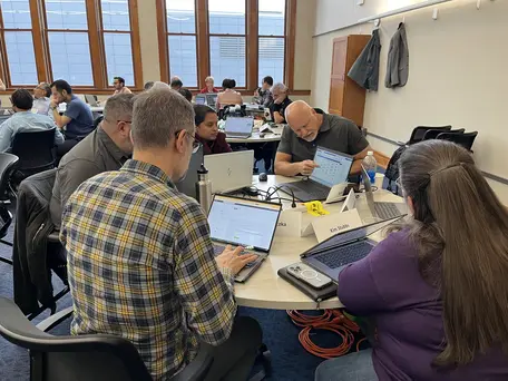 Participants sharing work at the 2025 workshop